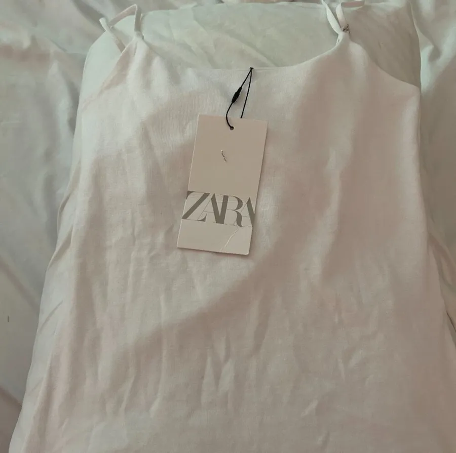 white tank top