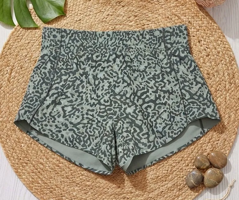 ATHLETA Sage Green Leopard Print Running Shorts | Dolphin Hem Lined