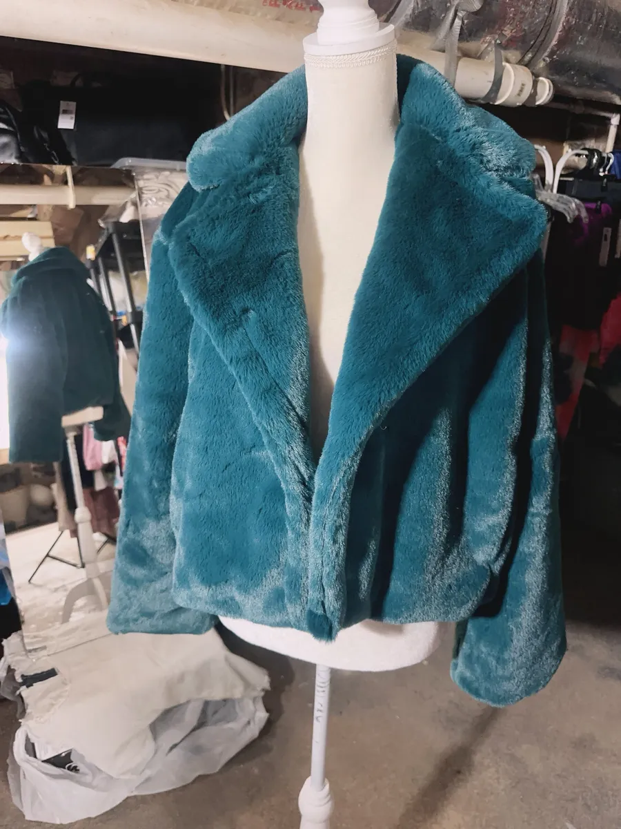 rain + rose TEAL GREEN faux fur long sleeve jacket with pockets soft warm comfy New with tag Smoke and pets free Same day shipping Faux fur: No ANIMALS WERE HARMED IN THE MAKING OF THIS FASHION THIS GARMENT HAS BEEN HANDCRAFTED BY Rain + Rose STAFF FOR YOUR COMFORT