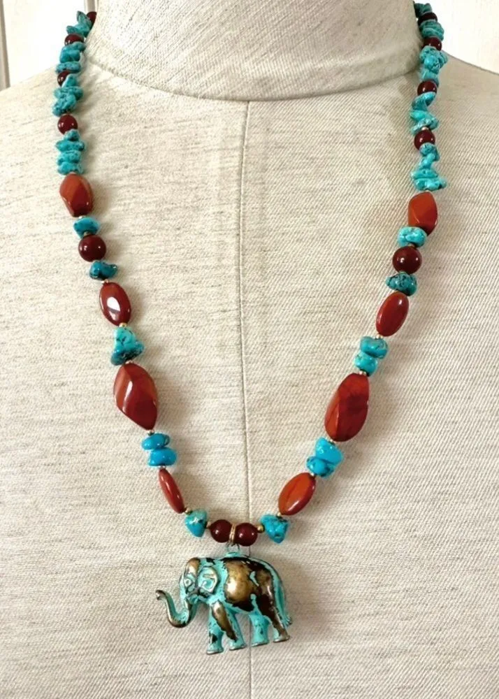Brass elephant pendant necklace with carnelian, turquoise and red jasper beads