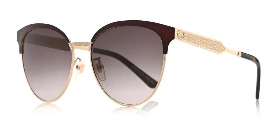 Gucci GG0074S Cat eye sunglasses gold metal frame purple gradient lenses