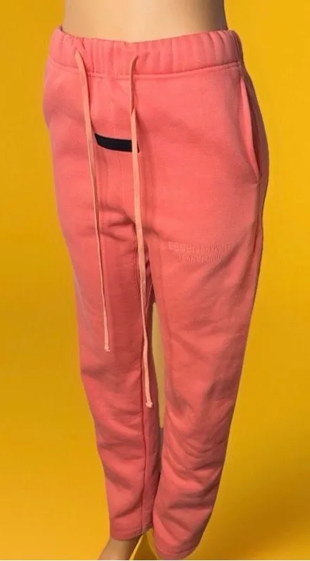 Peach fear of god sweatpants