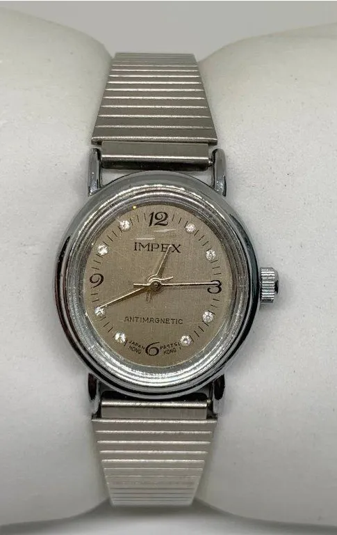 Vintage Impex mechanical wind up women’s watch 23mm japan silver tone works