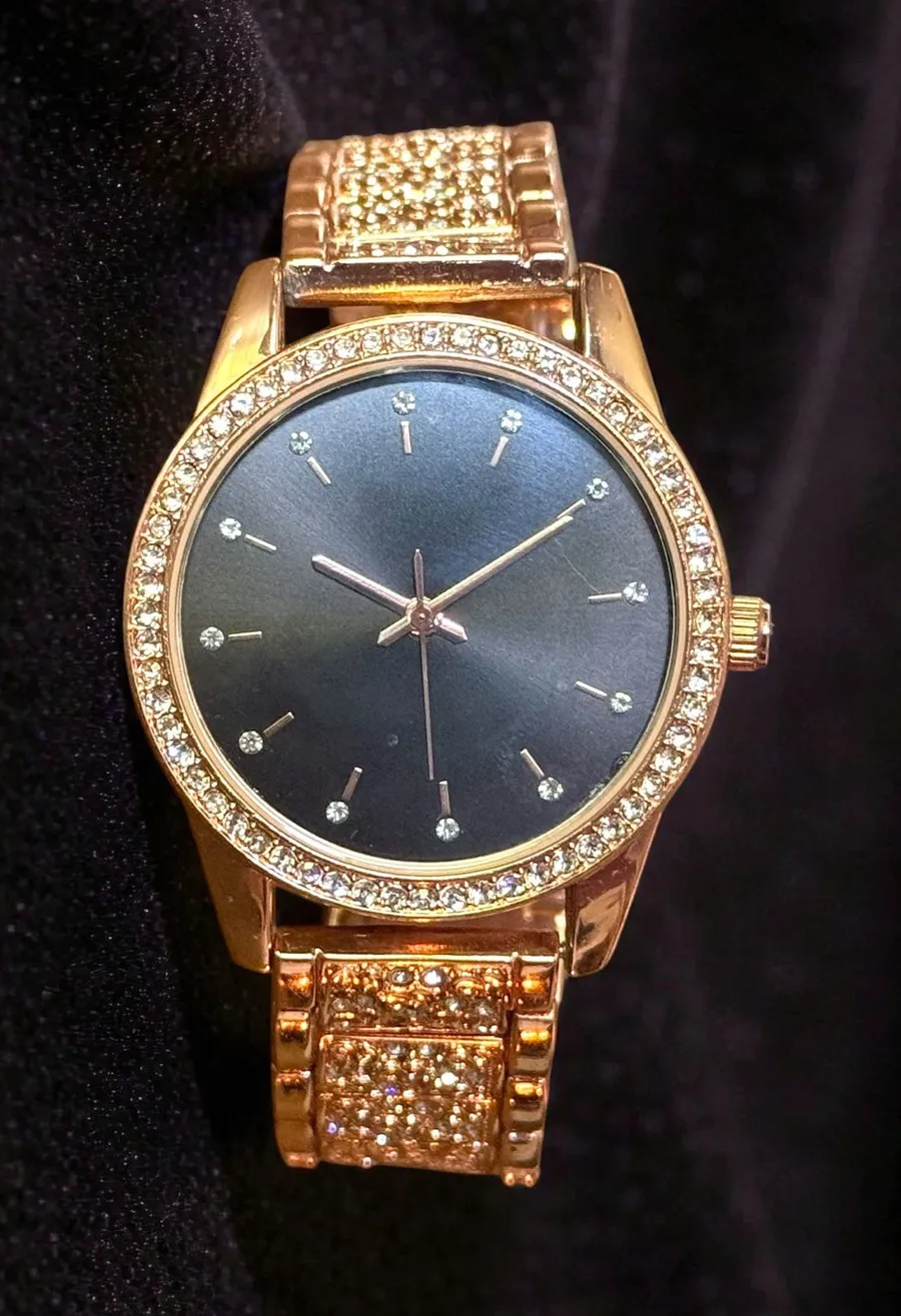 Rose gold iced quartz watch