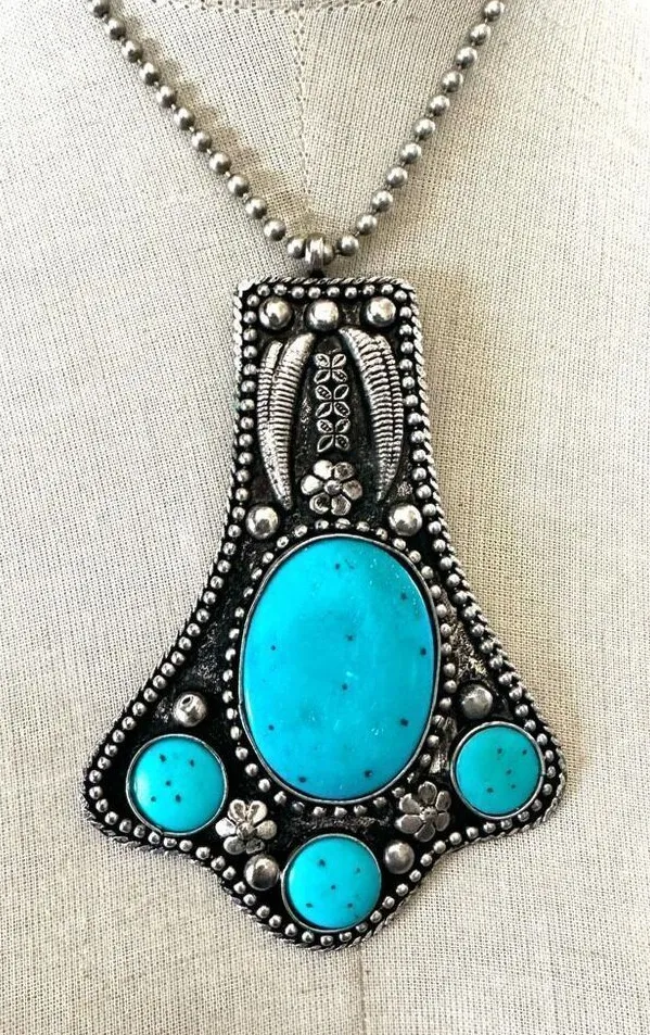 Silver tone turquoise blue southwestern large pendant necklace