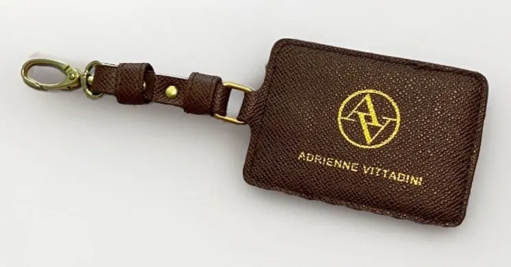 Adrienne Vitadini Brown luggage tag ID holder brown leather gold tone Logo