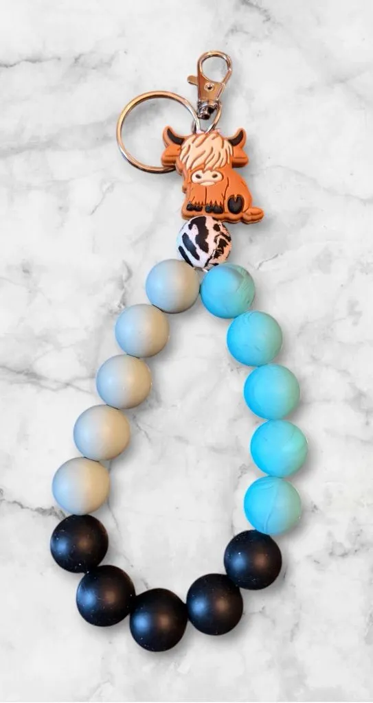 Gradient Blue and Black Beaded Keyring with Orange Cow Charm