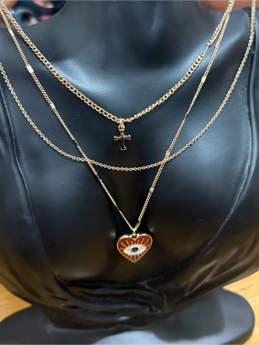 AVON Heartful Embrace Layered Necklace Goldtone Cross Evil Eye Heart Gold