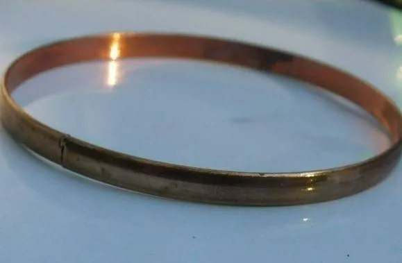 Older Style Copper Bangle Bracelet Orange