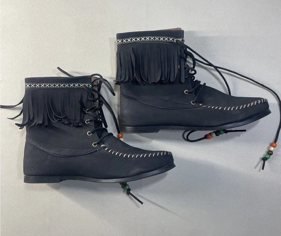 a pair of black suede fringe ankle boots Size 9.5