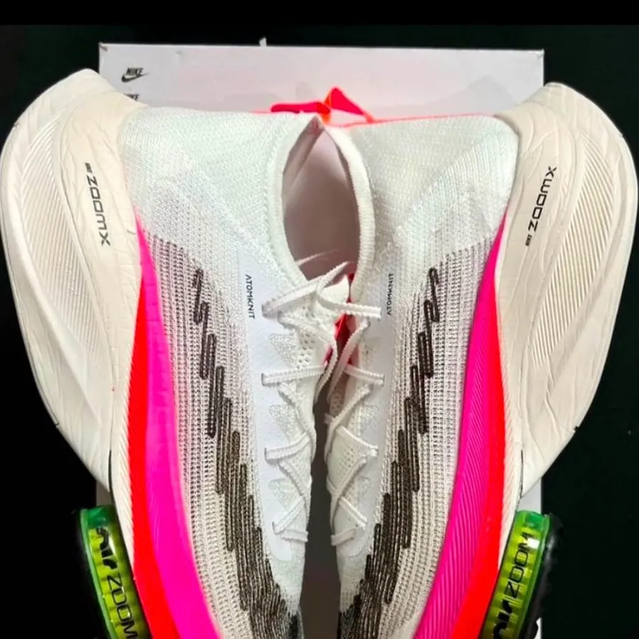Nike White and Pink Athletic Shoes for Performance Alphafly Next% Flyknit.