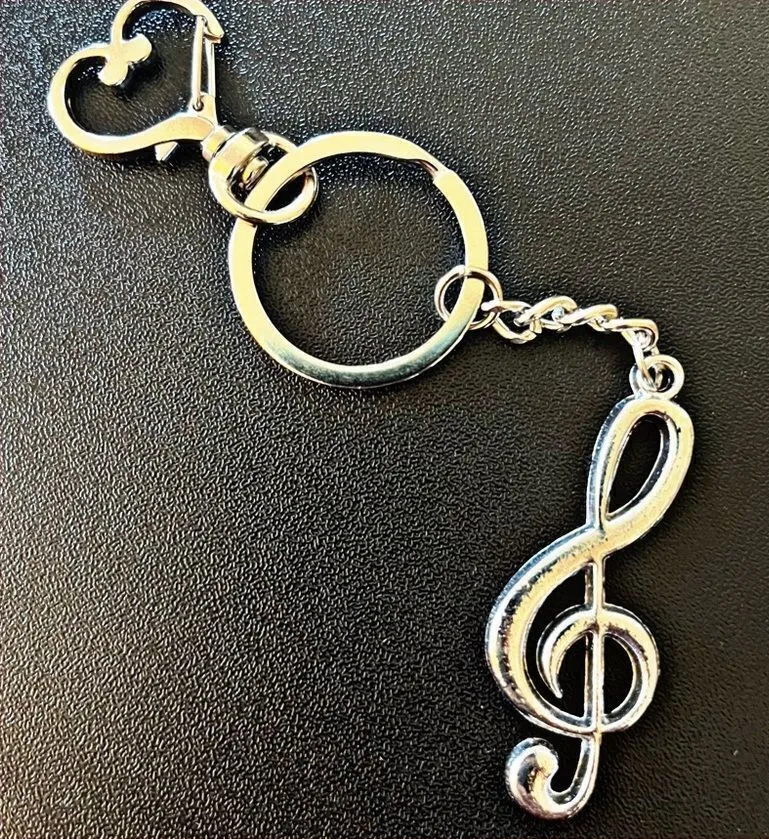 *30off3* NWOT. Silver Music Sign Keychain or Accessory.