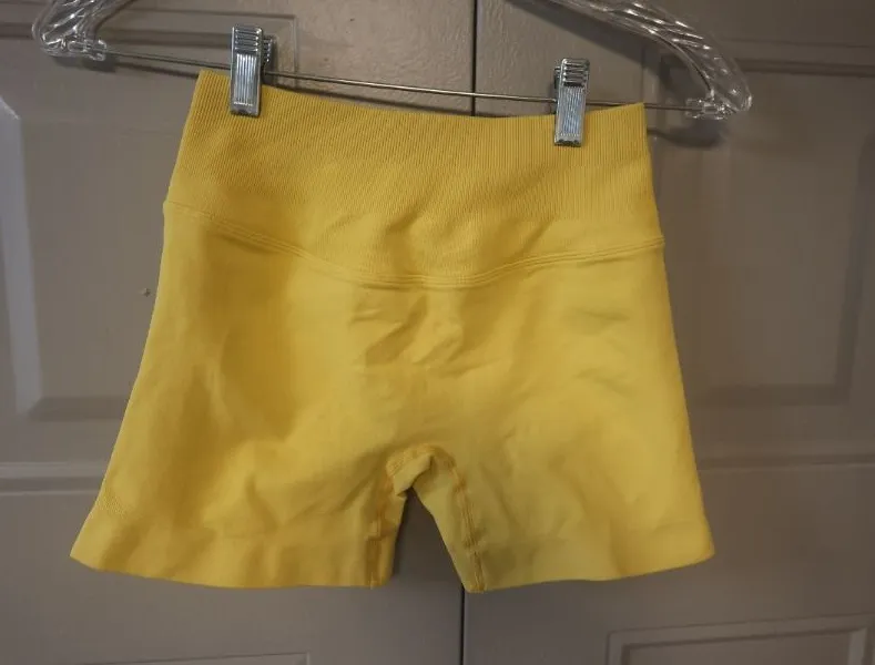Workout booty shorts bundle of XS's exercise shorts in yellow and brown.