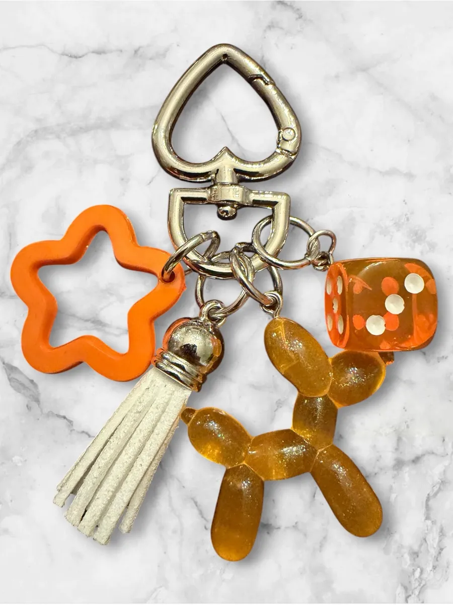 Orange Novelty Charm Keychain with Star, Dice & Balloon Dog