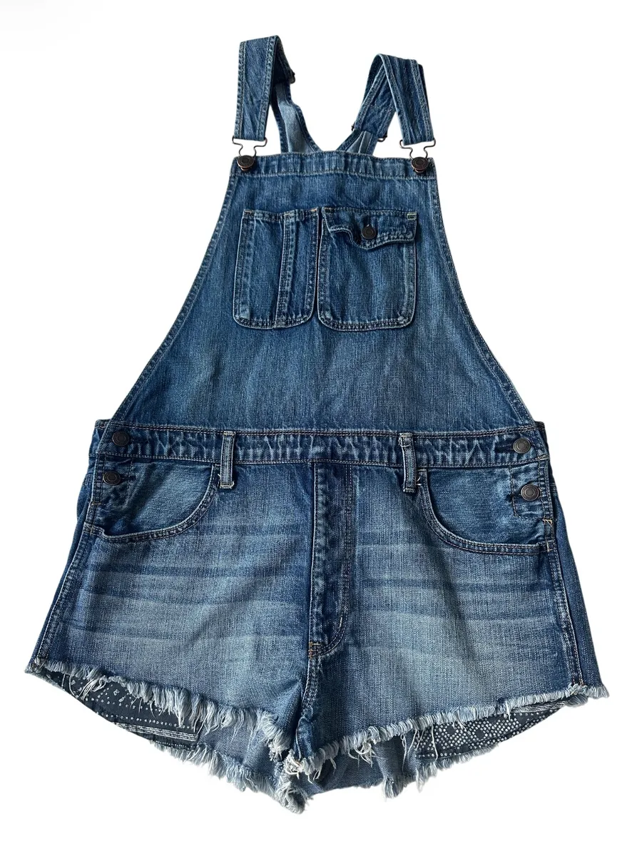 American Eagle medium-wash distressed denim short overalls