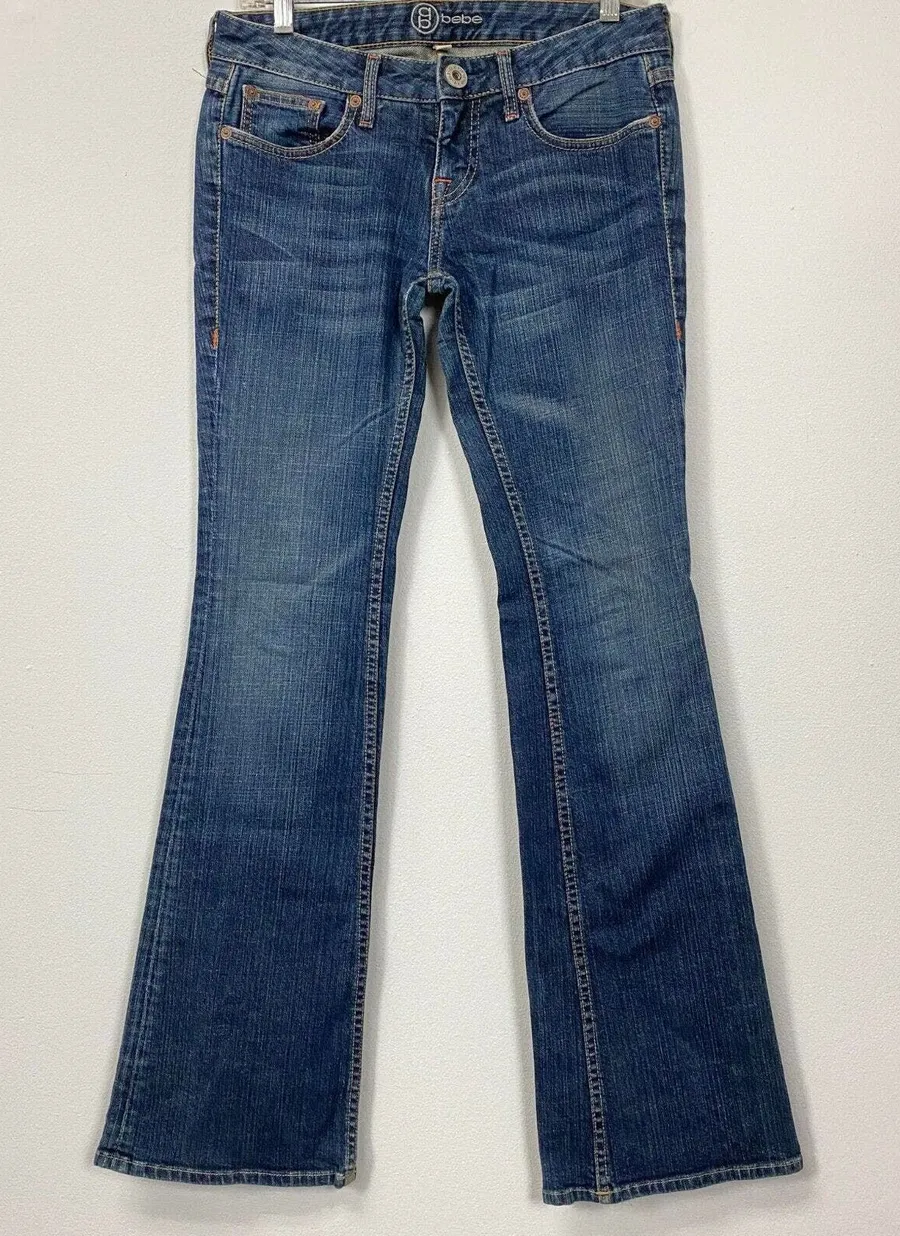Bebe EWomens Dark Wash Blue Denim Bootcut Low Rise Pants size 28 FLAWED
