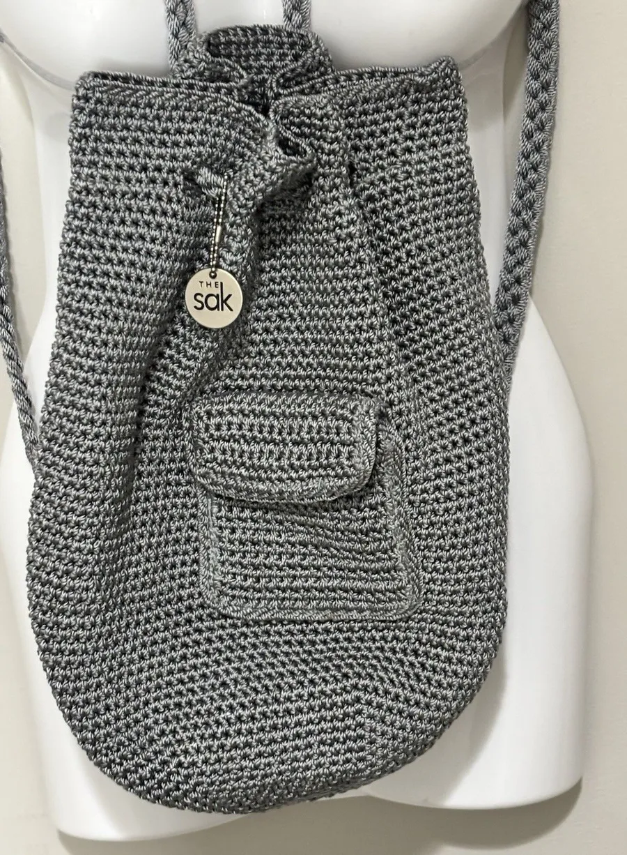 The Sak Bohemian Gray Crochet Drawstring Backpack Bucket Bag Purse