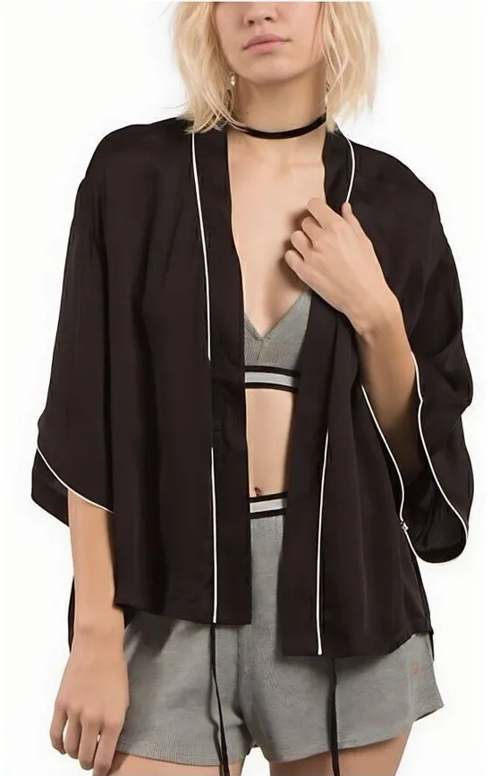 New. Volcom black kimono top. Small. Retails $129