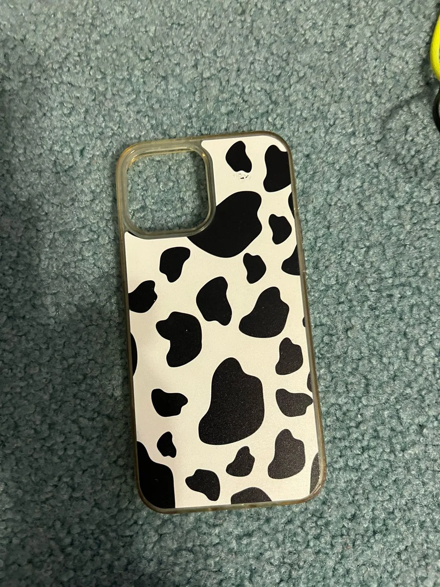 Stylish cow print phone case in black and white. Perfect for adding a unique touch to your phone. Black and white cow print phone case for iPhone 13 Pro Max #phoneaccessories