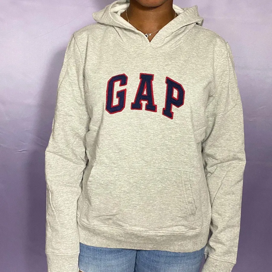 heather grey hoodie Tagged women’s Large L fits a bit smaller classic logo at the front chest area in scarlet red and navy blue. It has a nice kangaroo pouch at the front Measurements: Length: 22” Bust: 44” Waist: 40” Hip: 38” Sleeve: 28”