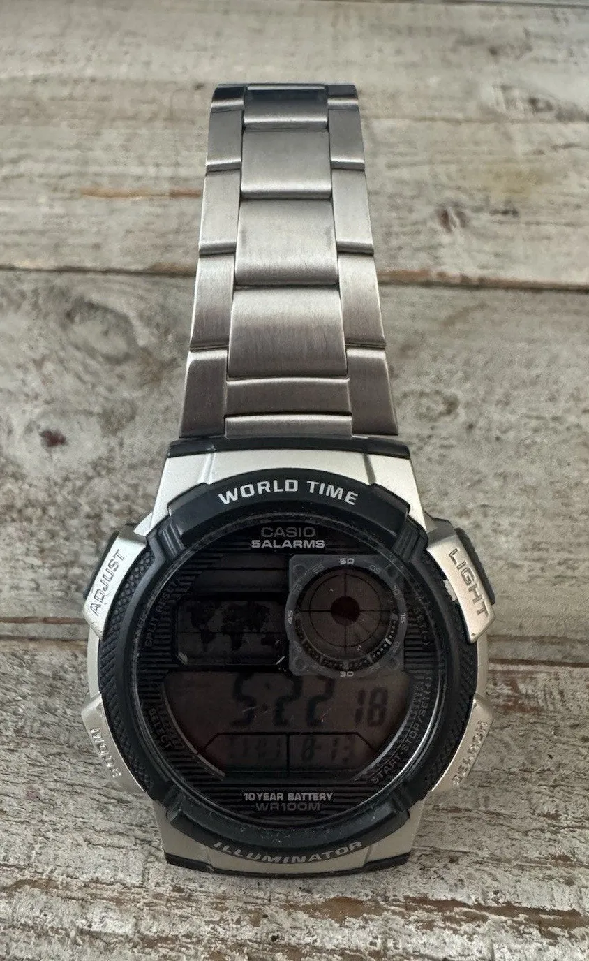 Casio AE-1000WD Illuminator World Time Digital Watch Stainless Steel 100M