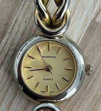 Majestron Ladies Watch Gold Tone Dial Gold Tone Knot Bracelet