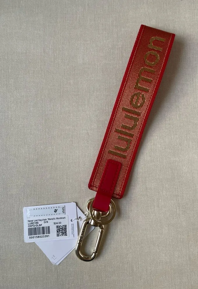 Lululemon Lunar New Year Never Lost Keychain *Metallic Wordmark