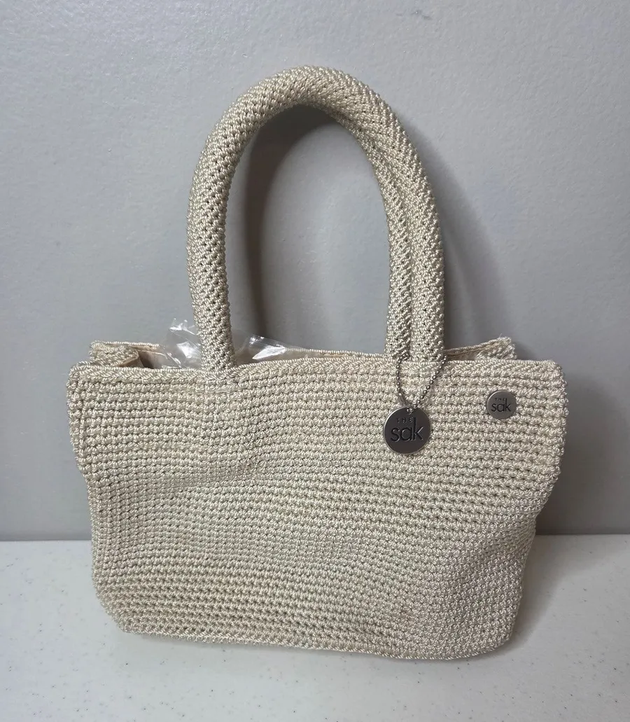 The Sak Cream Crochet Knit Handbag Small Two Handled Purse with Bag Charm