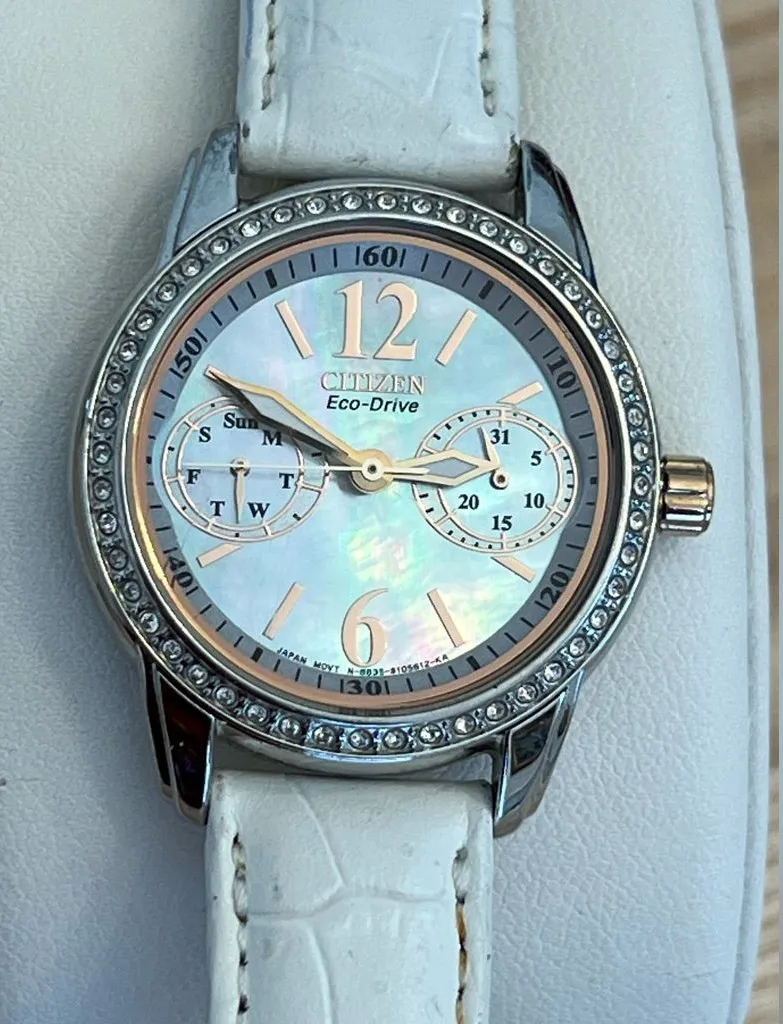 Citizen Eco-Drive Ladies Watch Crystals Pearl Dial Day/Date Stainless Case
