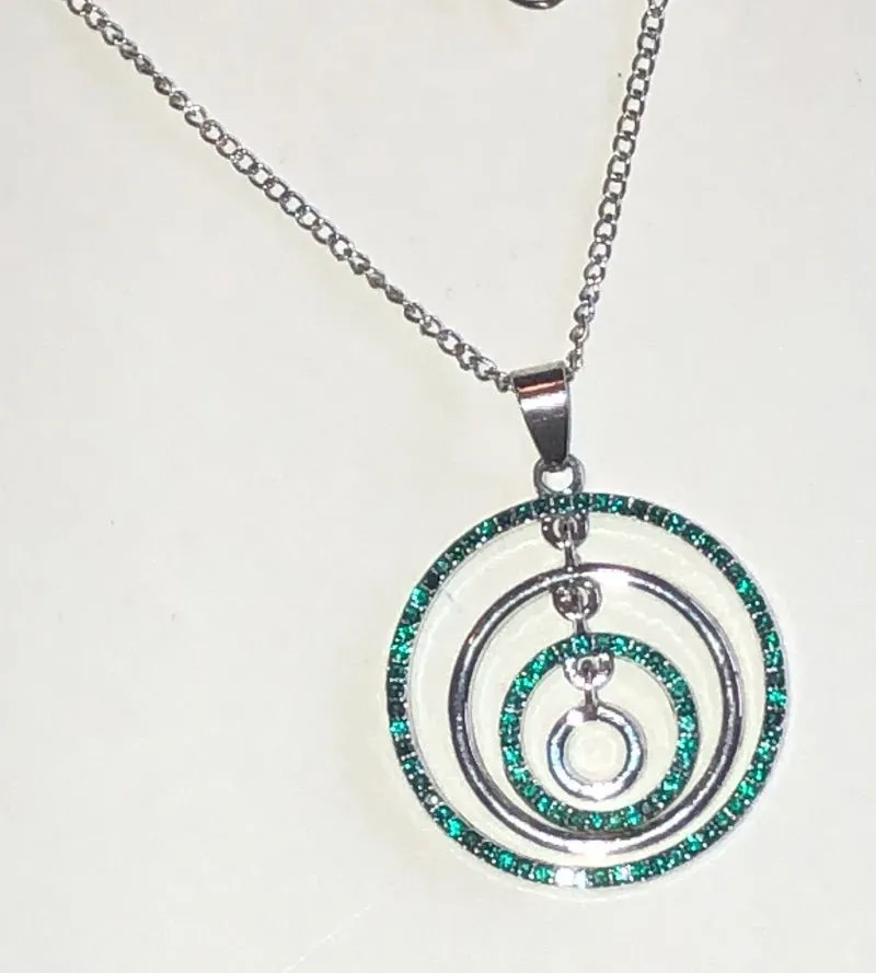 Silver Tone Necklace with Green Crystal Circular Pendant