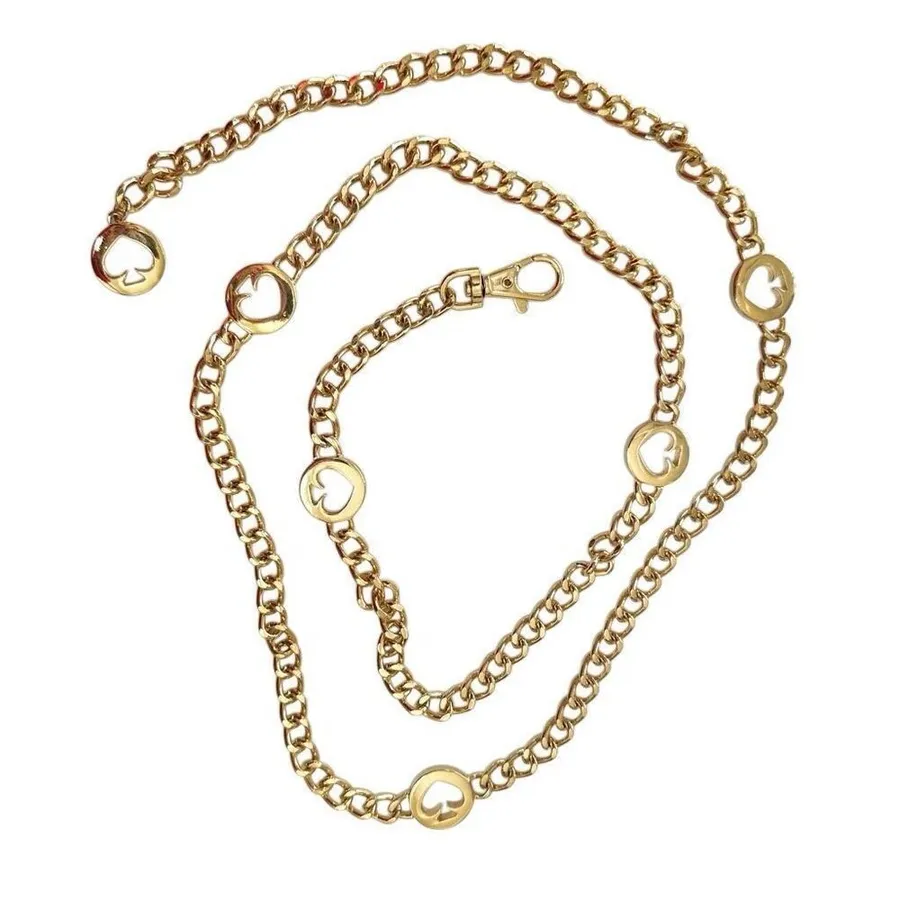 Gold tone spade hip belt