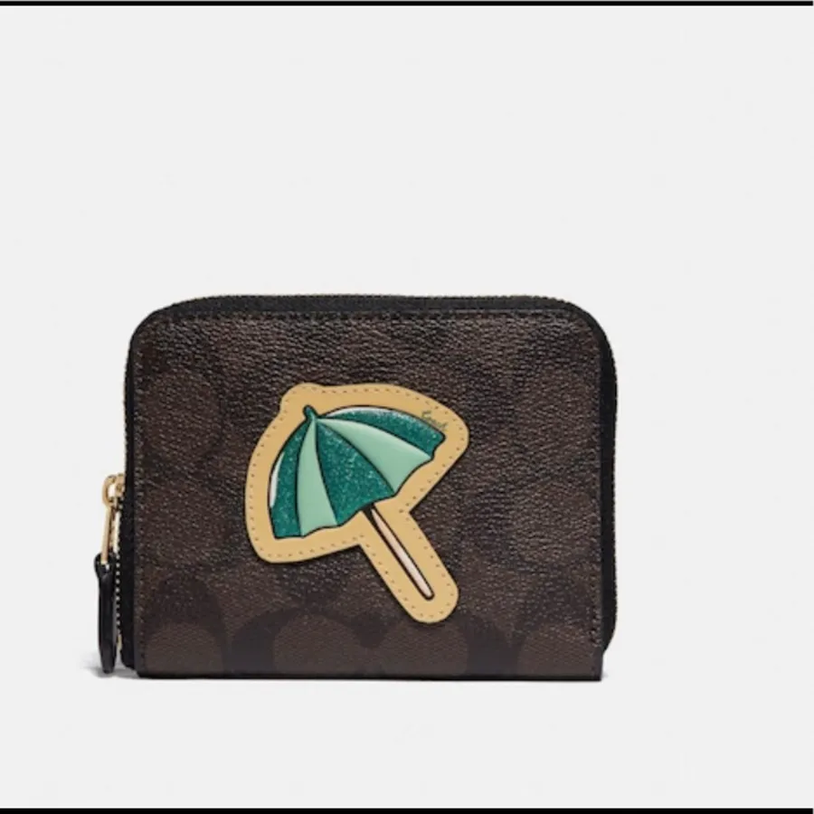 Authentic COACH Signature canvas/leather umbrella zip around wallet
