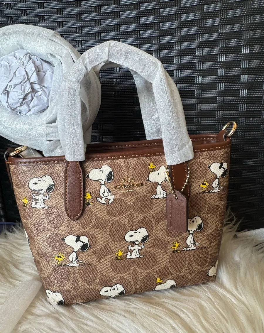 Coach X Peanuts City Mini Tote Bag In Signature Canvas With Snoopy Print CBS83