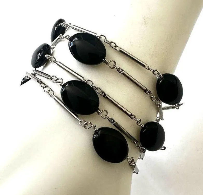 Black and silver tone multi strand beaded bracelet