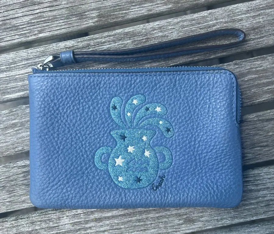 Coach Blue Pebbled Leather Wristlet with Starburst Applique