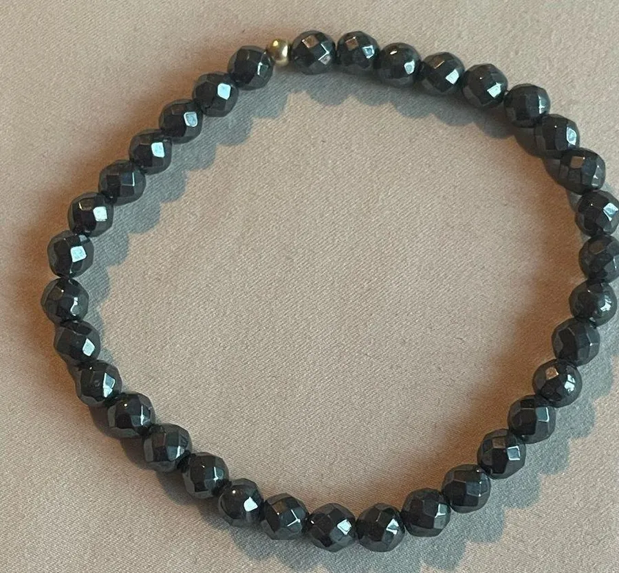 Black Beaded Bracelet with gold bead