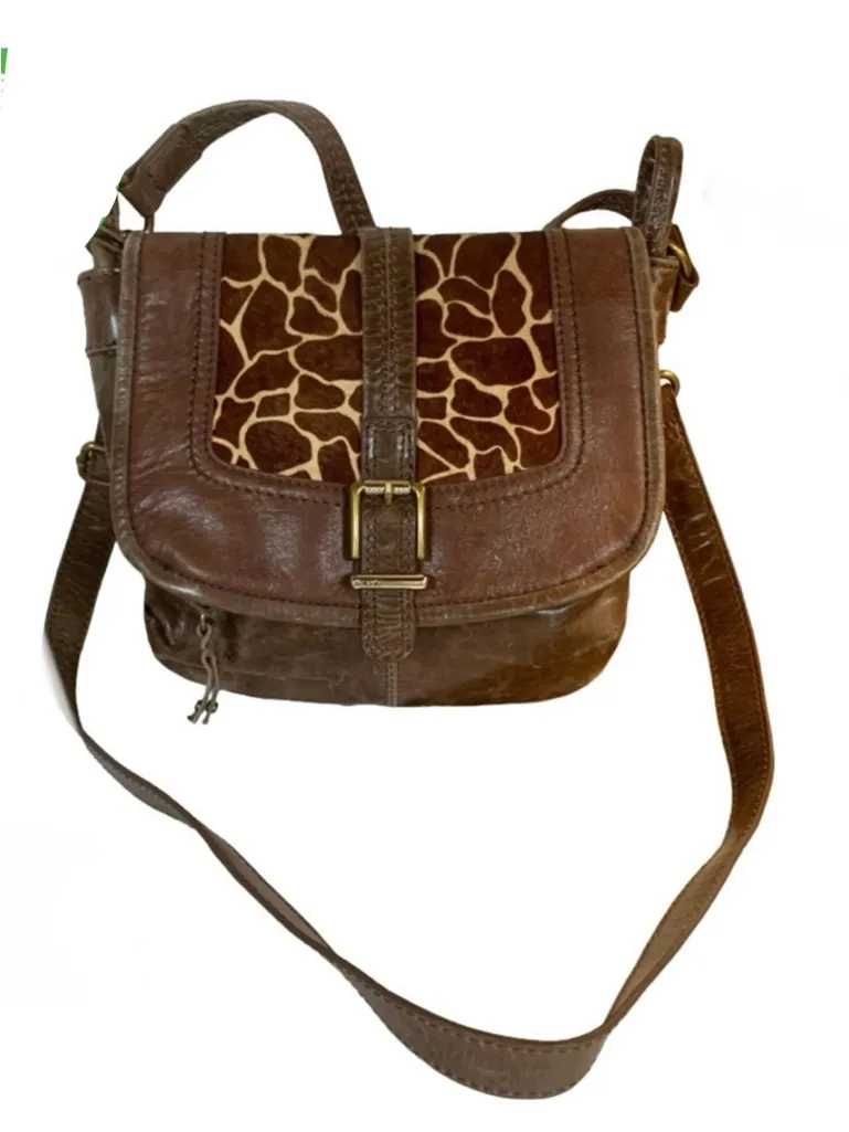 THE SAK BROWN DISTRESSED LEATHER W/CALF HAIR IN GIRAFFE PRINT BAG