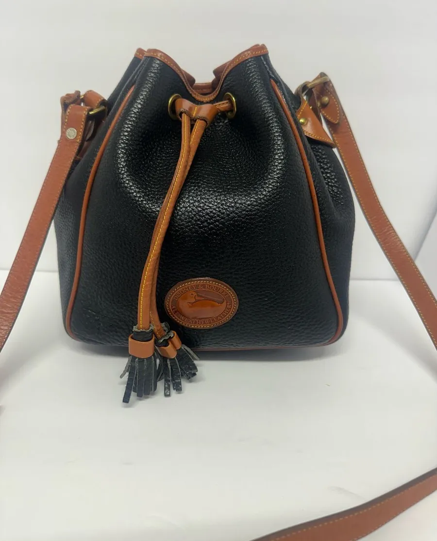 Dooney & Bourke Black Pebbled Leather Drawstring Bucket Bag with Tan Trim