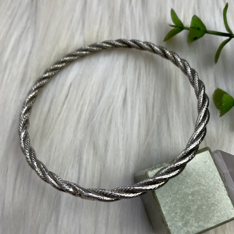 Twisted silver tone bangle bracelet
