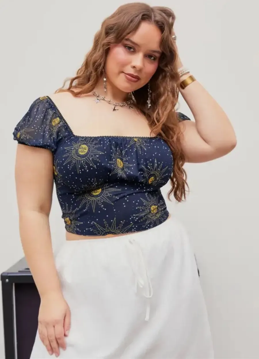 Navy blue sun print lace trim puff sleeve top
