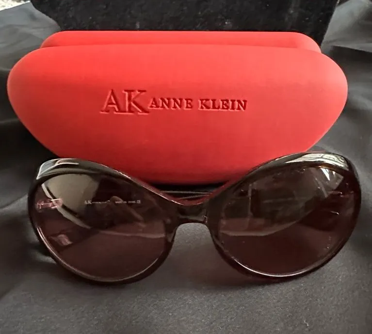 Anne Klein EUC sunglasses. Dark tortoise frames & plum color lenses w/ case
