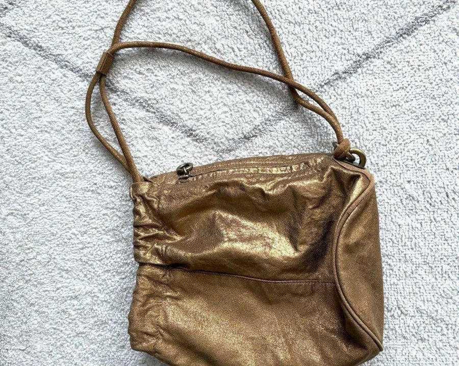 Vintage DKNY Metallic Gold Leather Backpack Purse Drawstring Shoulder Bag