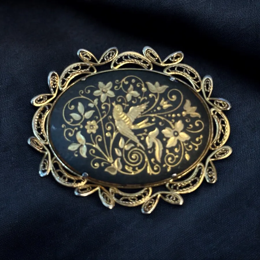 Vintage large oval Damascene bird brooch Gold