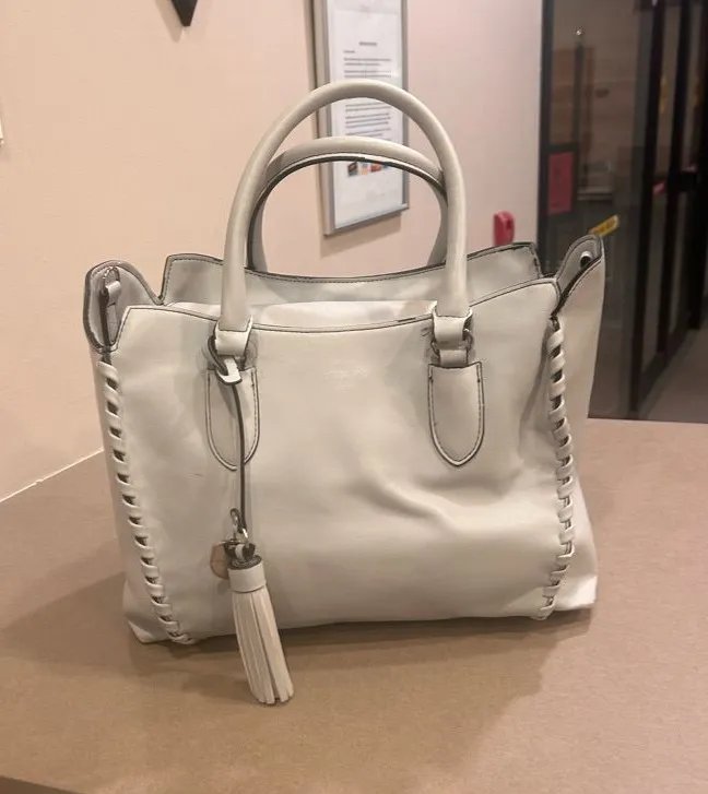 London Fog Cream Leather Tote with Tassel Accent