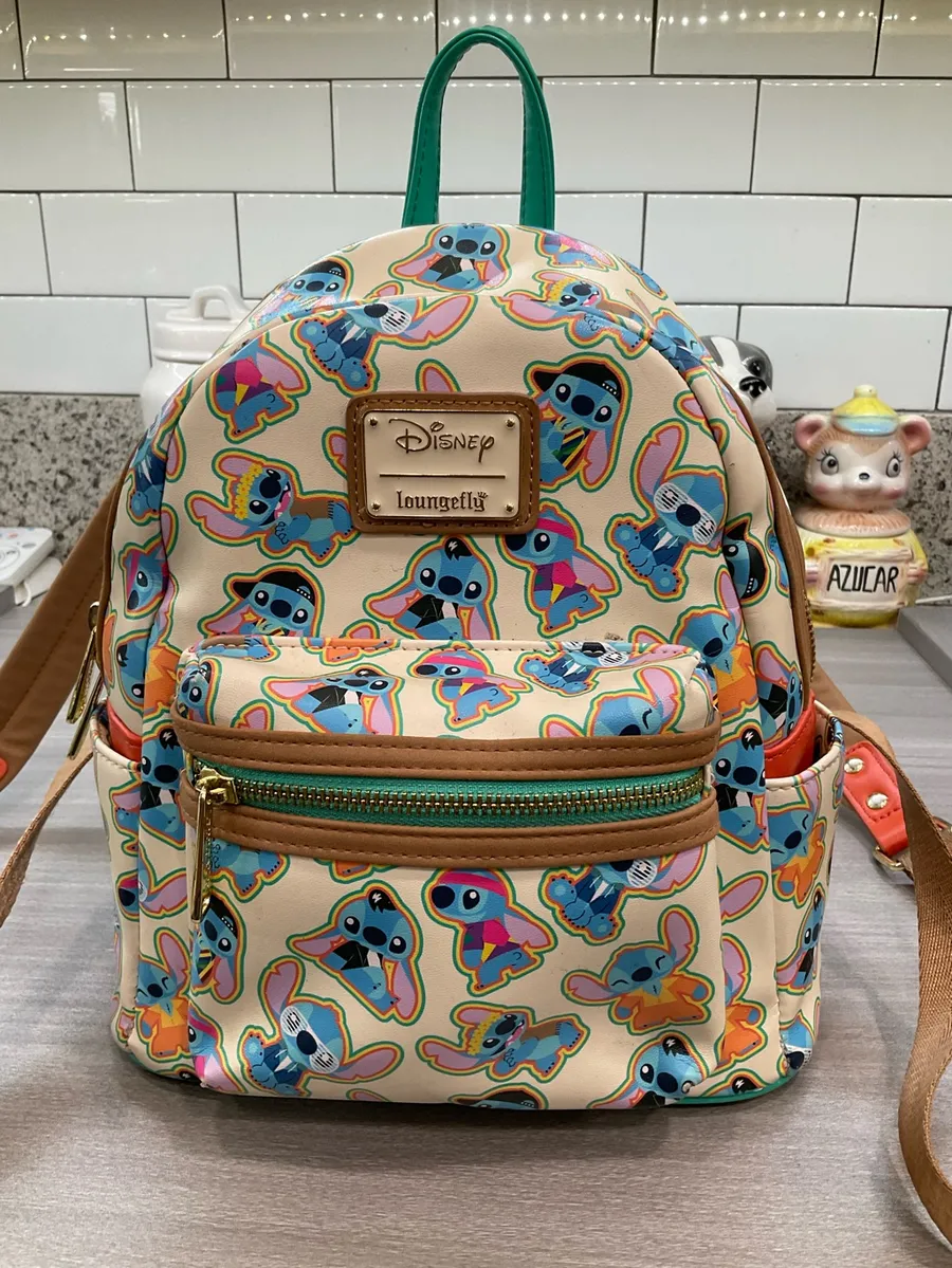 LOUNGEFLY DISNEY LILO & STITCH DECADE OUTFITS MINI BACKPACK