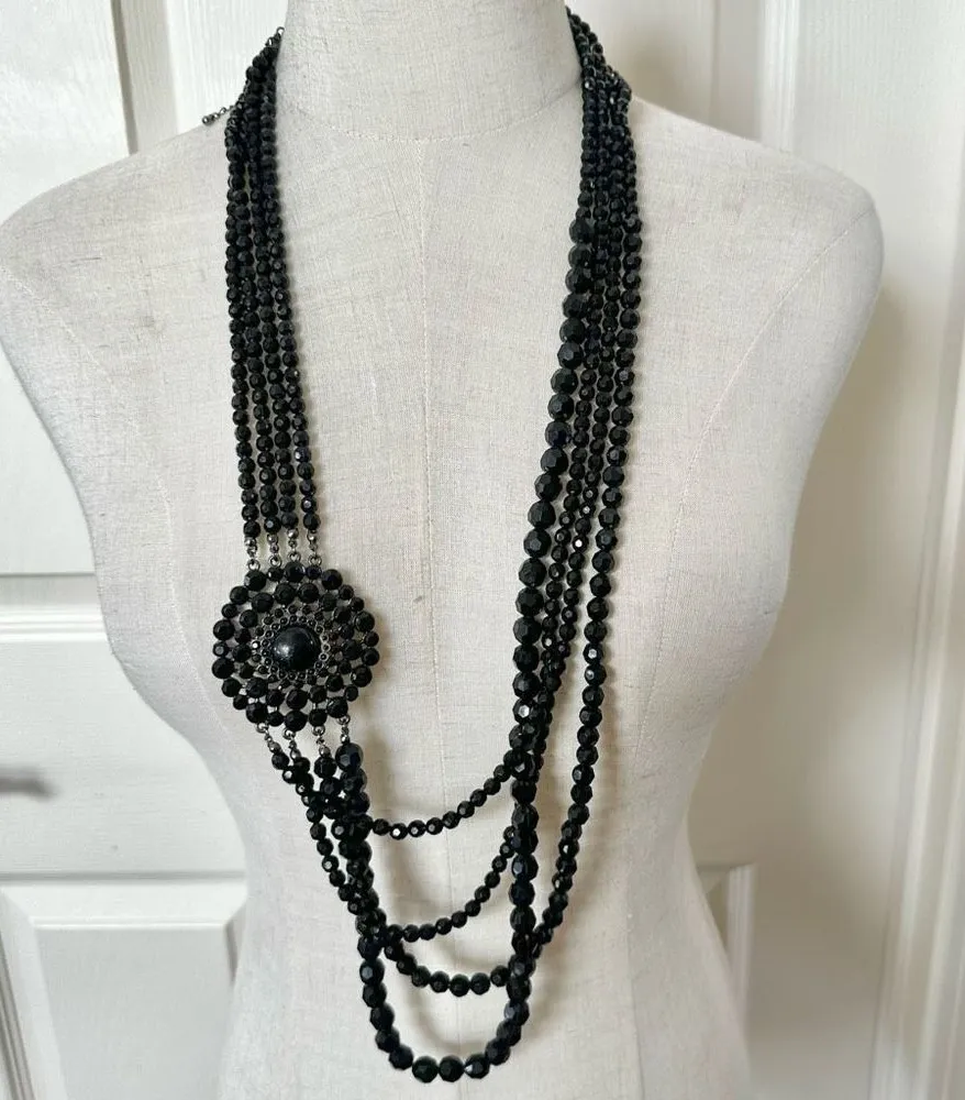 Long multi strand black beaded flower necklace Black