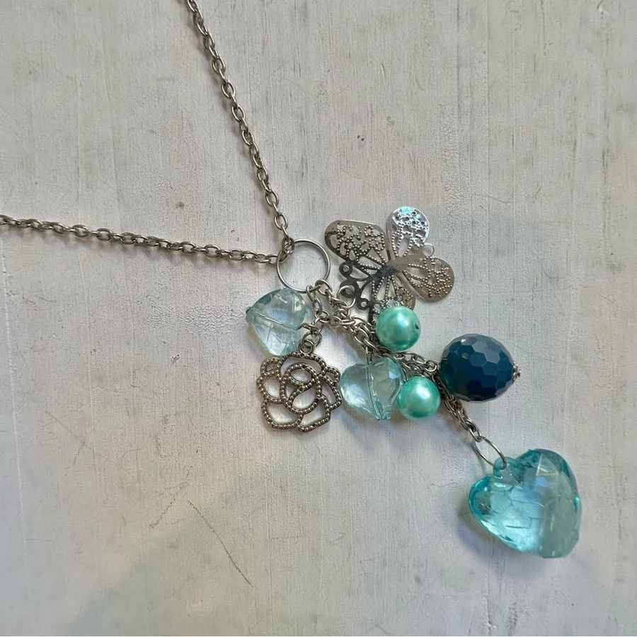 Long silver tone blue charm necklace Blue