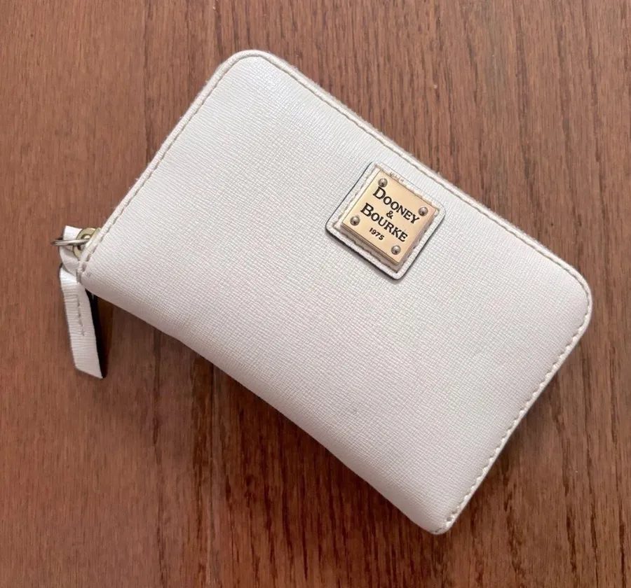 Dooney and Bourke white leather medium zip around wallet