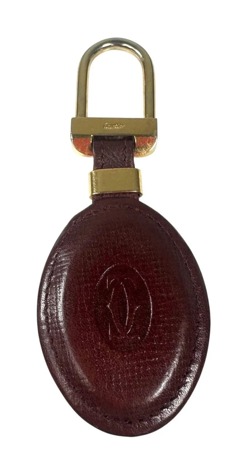 Cartier Bordeaux Leather Oval Keychain Vintage Gold Tone Logo Bag Charm Key Ring