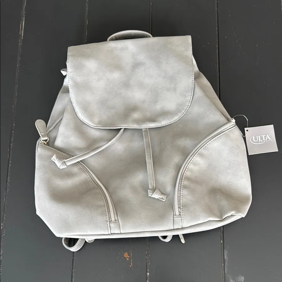 Ulta Beauty Gray Backpack with Adjustable Straps and Flap Closure